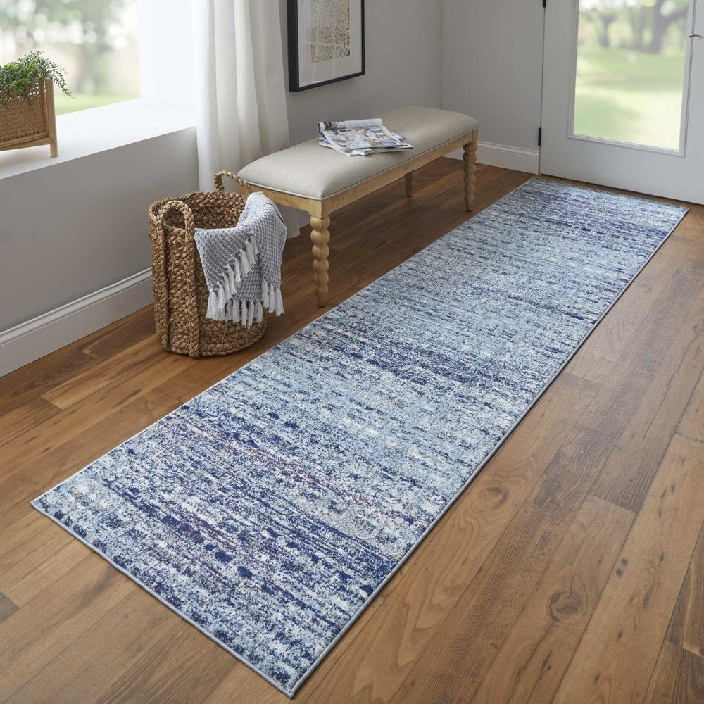 10' X 14' Blue And Ivory Abstract Power Loom Stain Resistant Area Rug