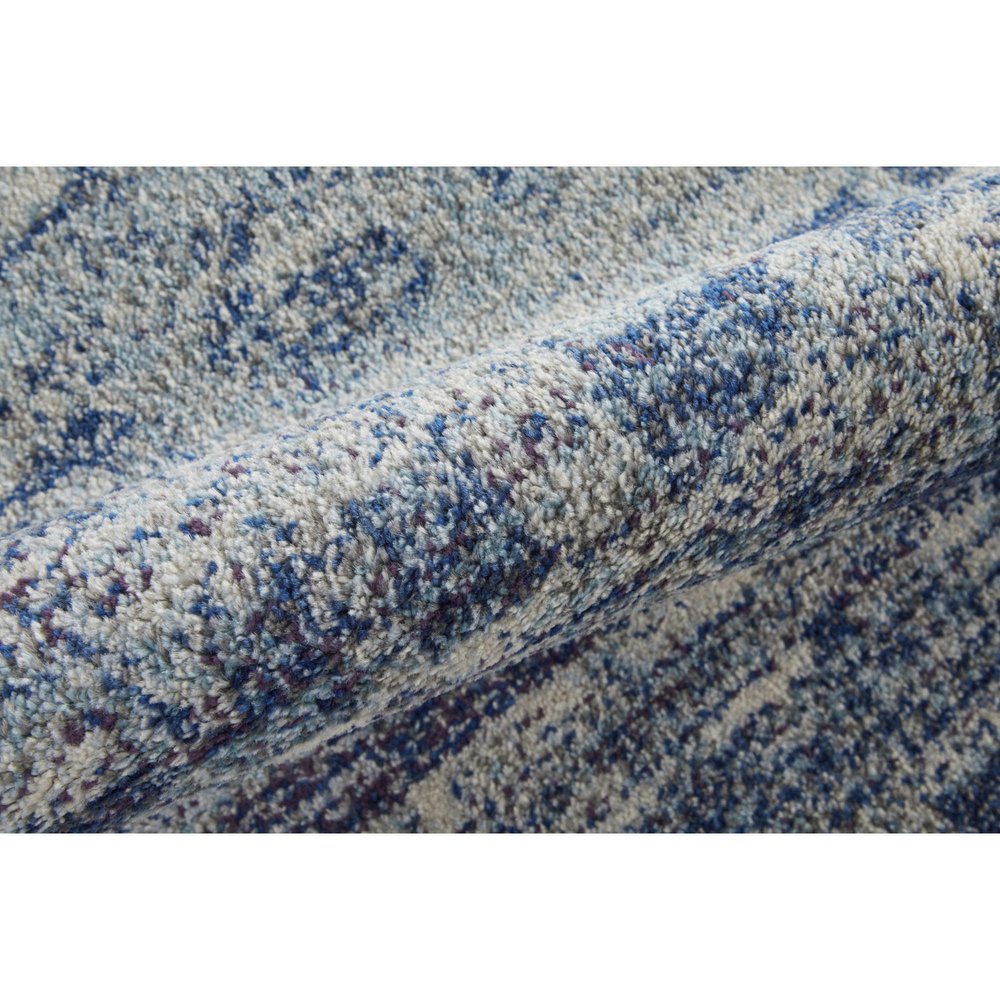 10' X 14' Blue And Ivory Abstract Power Loom Stain Resistant Area Rug