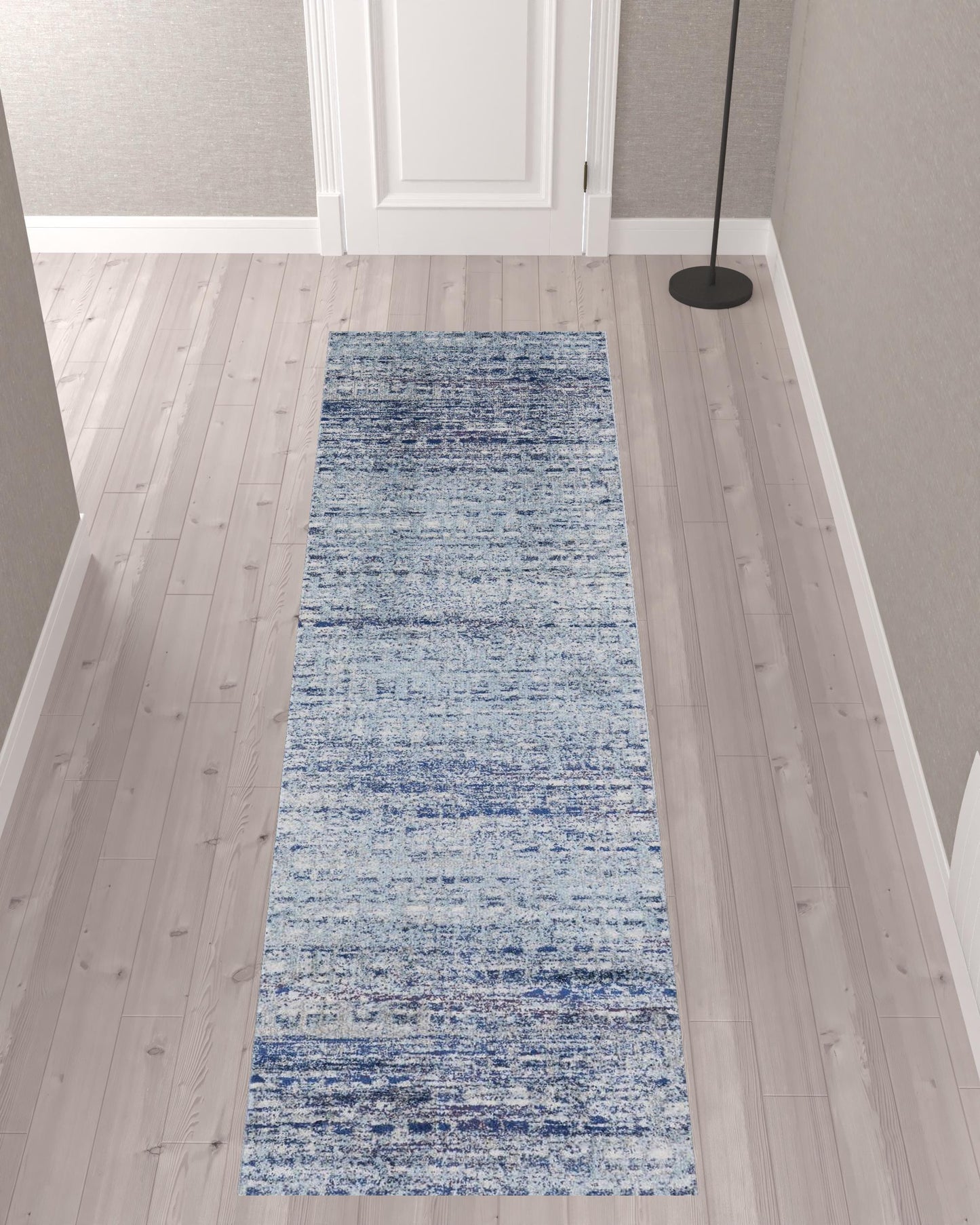 3' X 5' Blue And Ivory Abstract Power Loom Stain Resistant Area Rug