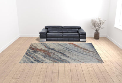 10' X 14' Ivory Orange And Blue Abstract Power Loom Stain Resistant Area Rug