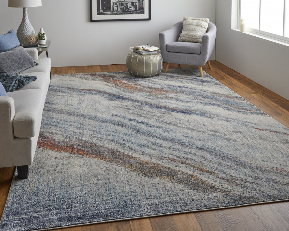 10' X 14' Ivory Orange And Blue Abstract Power Loom Stain Resistant Area Rug
