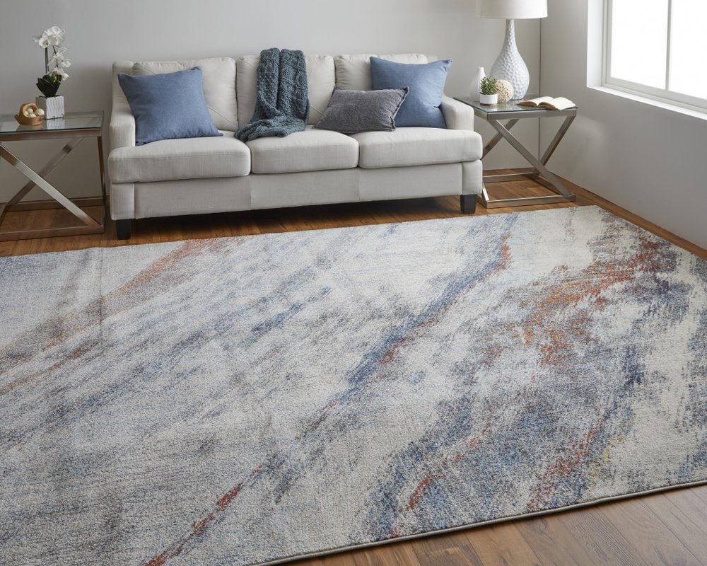 10' X 14' Ivory Orange And Blue Abstract Power Loom Stain Resistant Area Rug