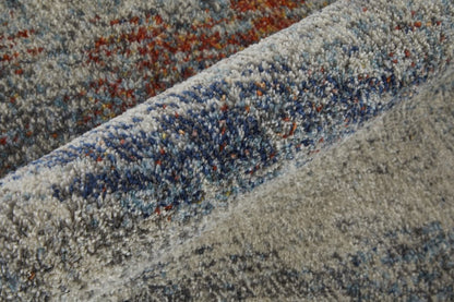 10' X 14' Ivory Orange And Blue Abstract Power Loom Stain Resistant Area Rug