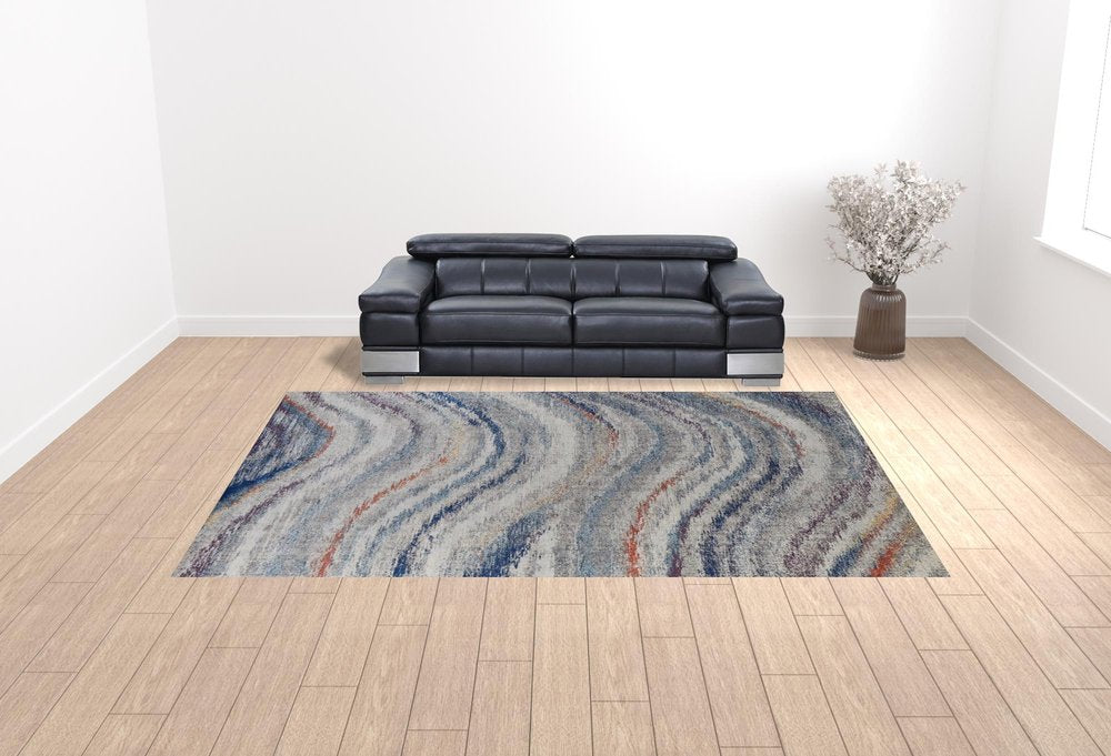 10' X 14' Blue Gray And Orange Abstract Power Loom Stain Resistant Area Rug