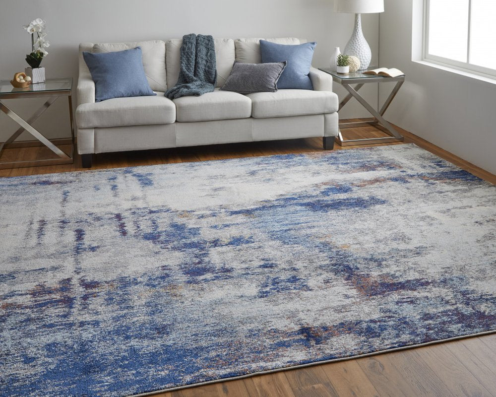 10' X 14' Ivory And Blue Abstract Power Loom Distressed Stain Resistant Area Rug