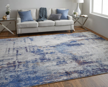 10' X 14' Ivory And Blue Abstract Power Loom Distressed Stain Resistant Area Rug