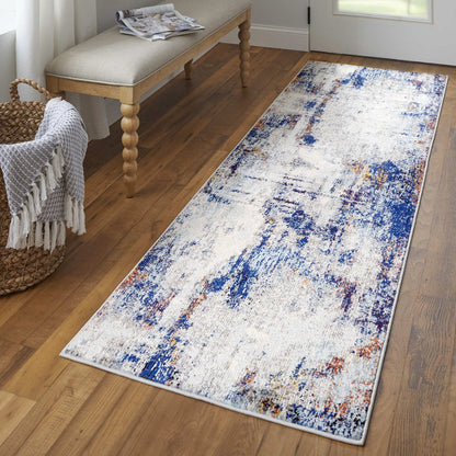 10' X 14' Ivory And Blue Abstract Power Loom Distressed Stain Resistant Area Rug