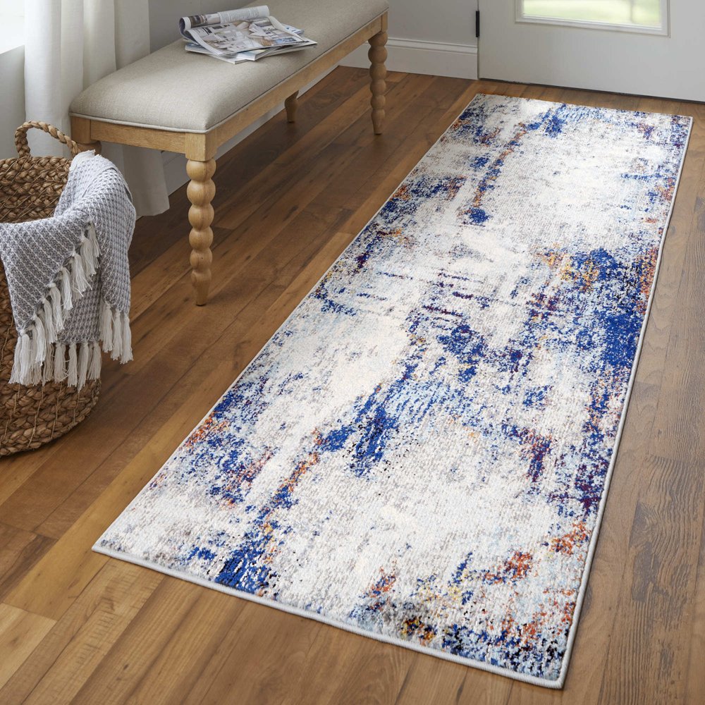 10' X 14' Ivory And Blue Abstract Power Loom Distressed Stain Resistant Area Rug