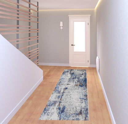 10' X 14' Ivory And Blue Abstract Power Loom Distressed Stain Resistant Area Rug