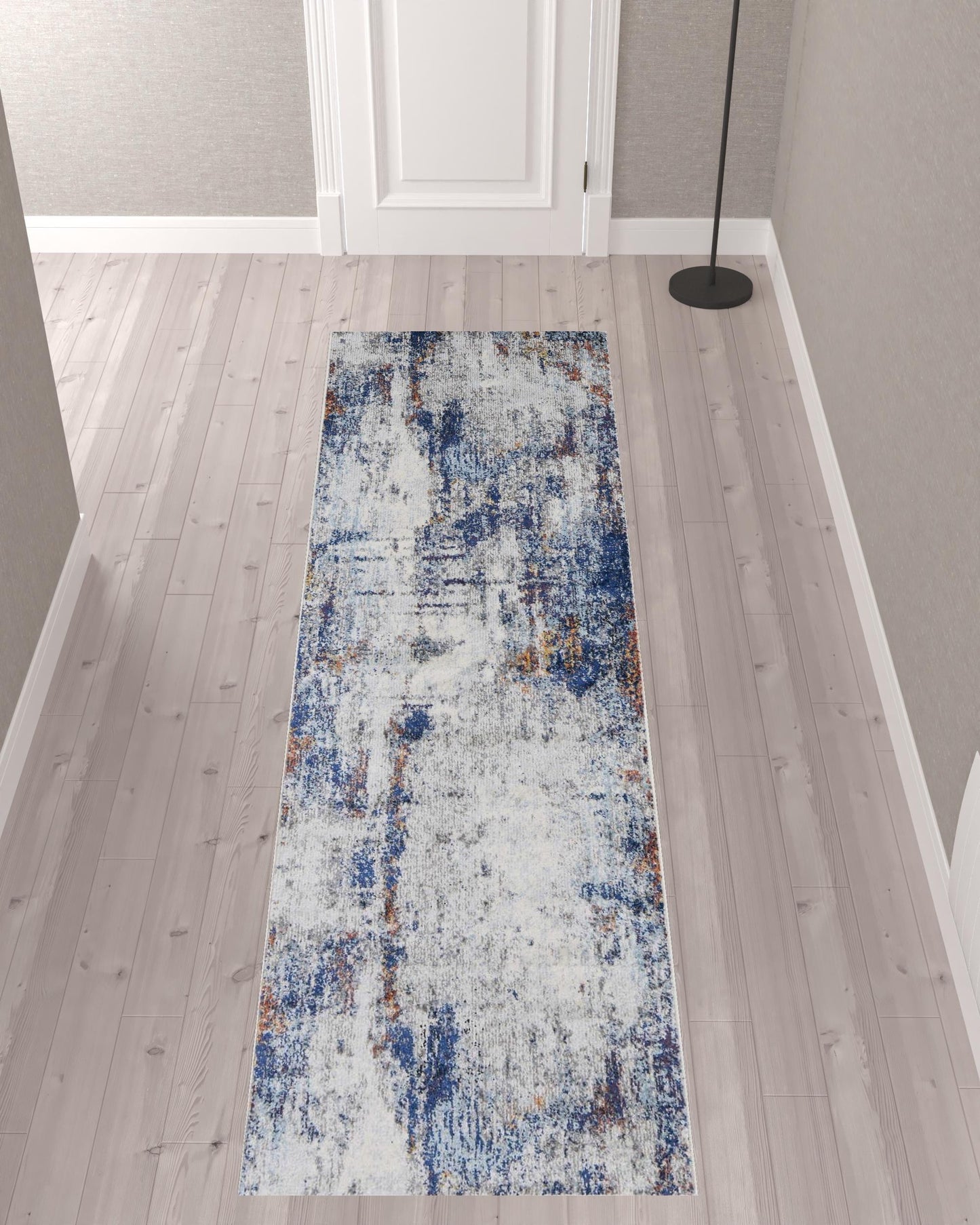 9' X 12' Ivory And Blue Abstract Power Loom Distressed Stain Resistant Area Rug