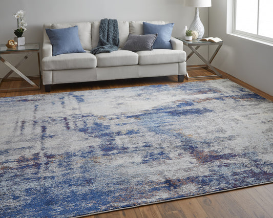 9' X 12' Ivory And Blue Abstract Power Loom Distressed Stain Resistant Area Rug