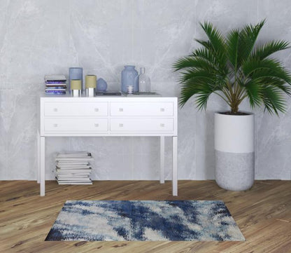 10' X 14' Blue And Ivory Abstract Power Loom Stain Resistant Area Rug