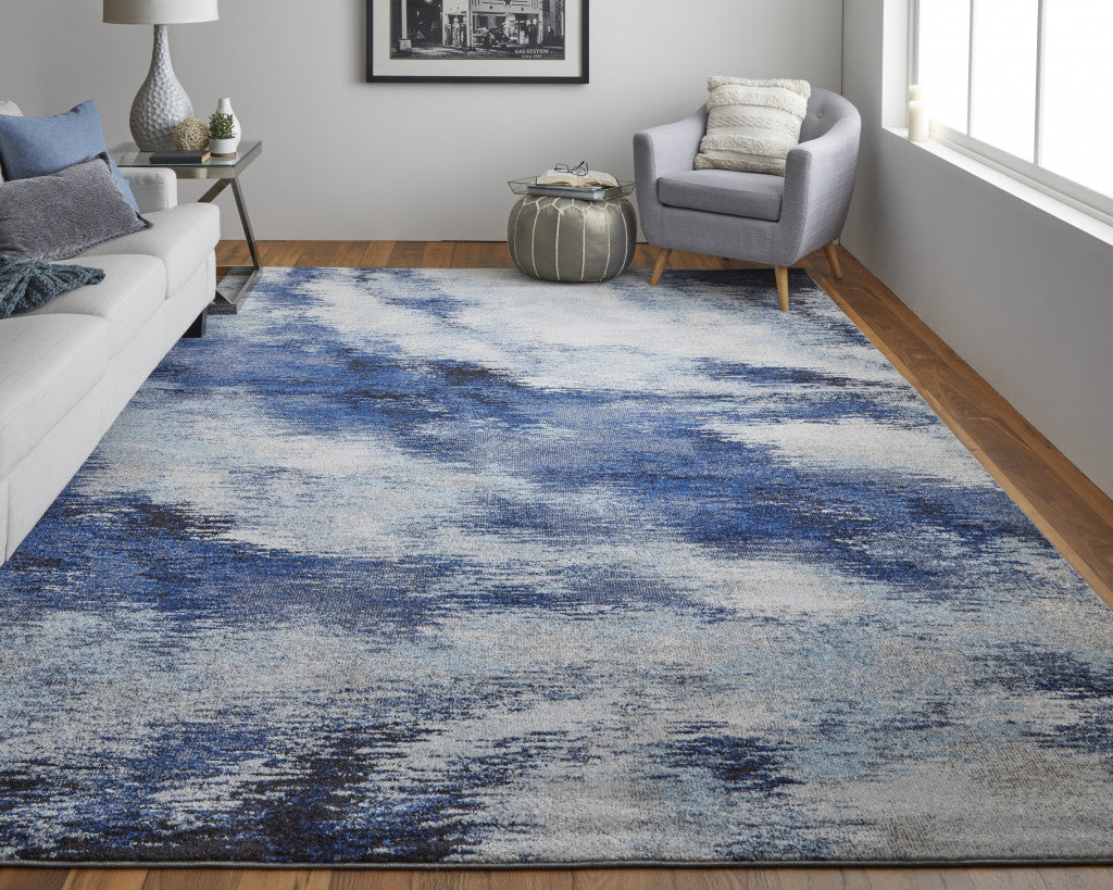 3' X 5' Blue And Ivory Abstract Power Loom Stain Resistant Area Rug