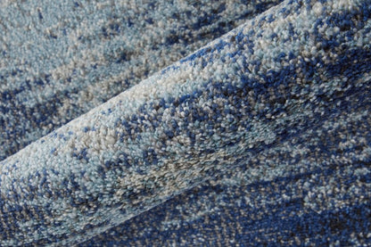 10' X 14' Blue And Ivory Abstract Power Loom Stain Resistant Area Rug
