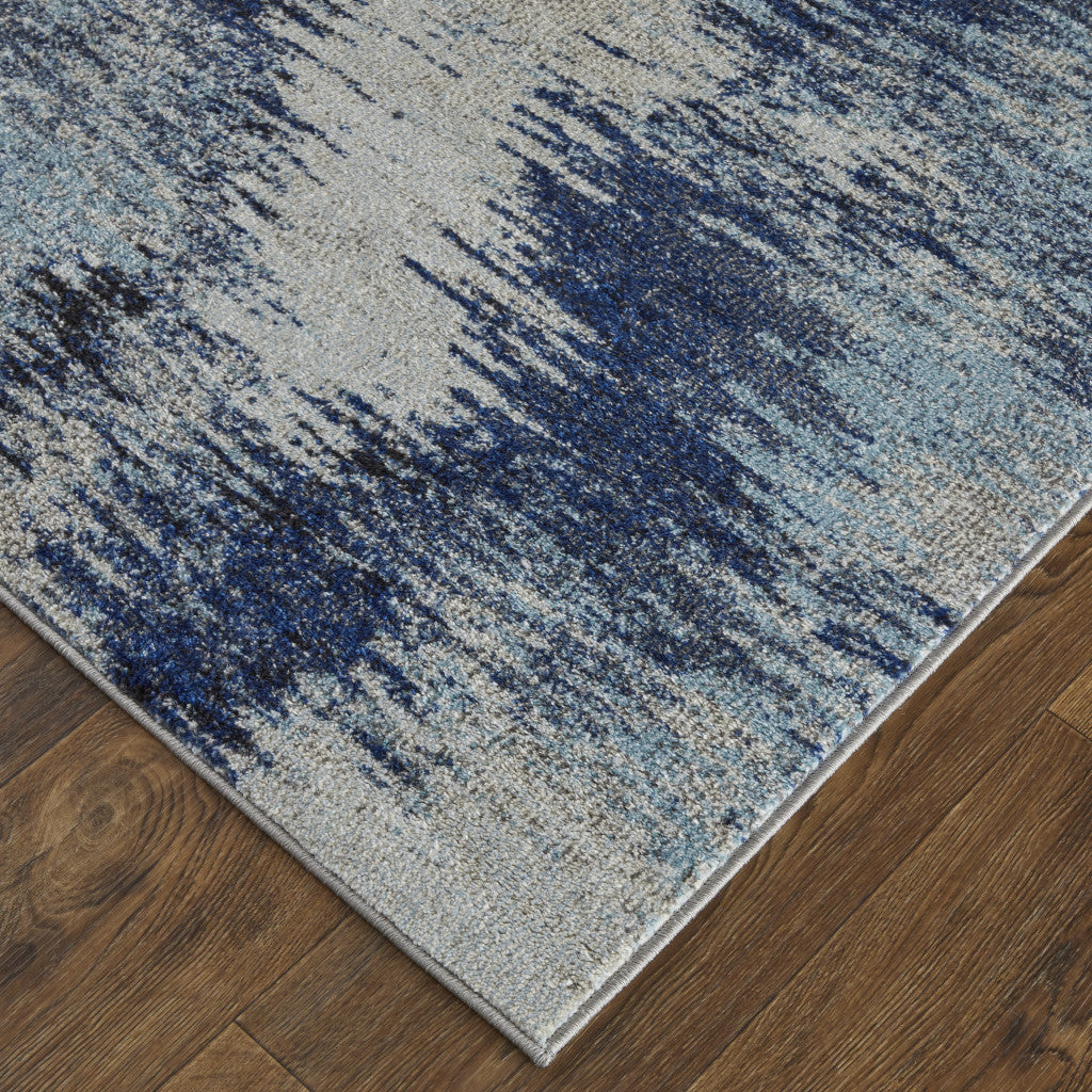 5' X 8' Blue And Ivory Abstract Power Loom Stain Resistant Area Rug