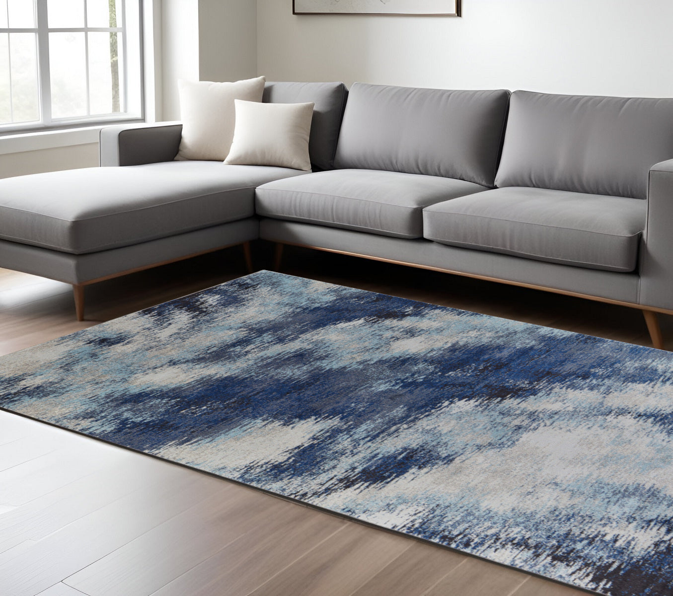 3' X 5' Blue And Ivory Abstract Power Loom Stain Resistant Area Rug