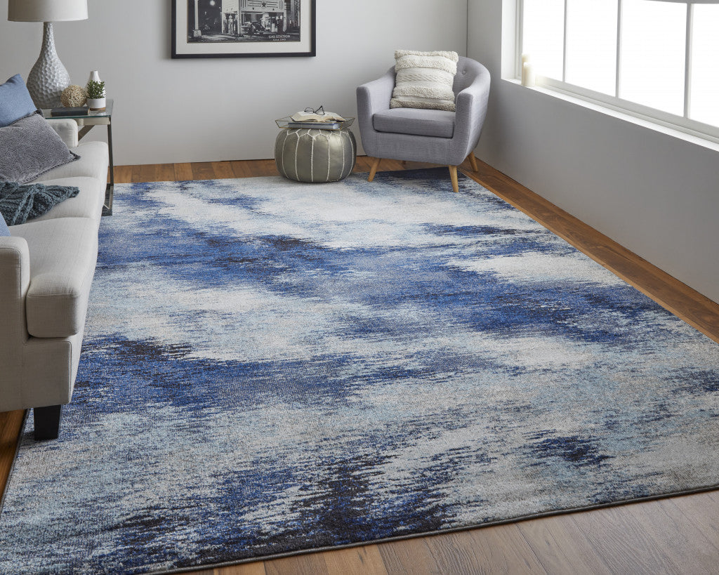 3' X 5' Blue And Ivory Abstract Power Loom Stain Resistant Area Rug