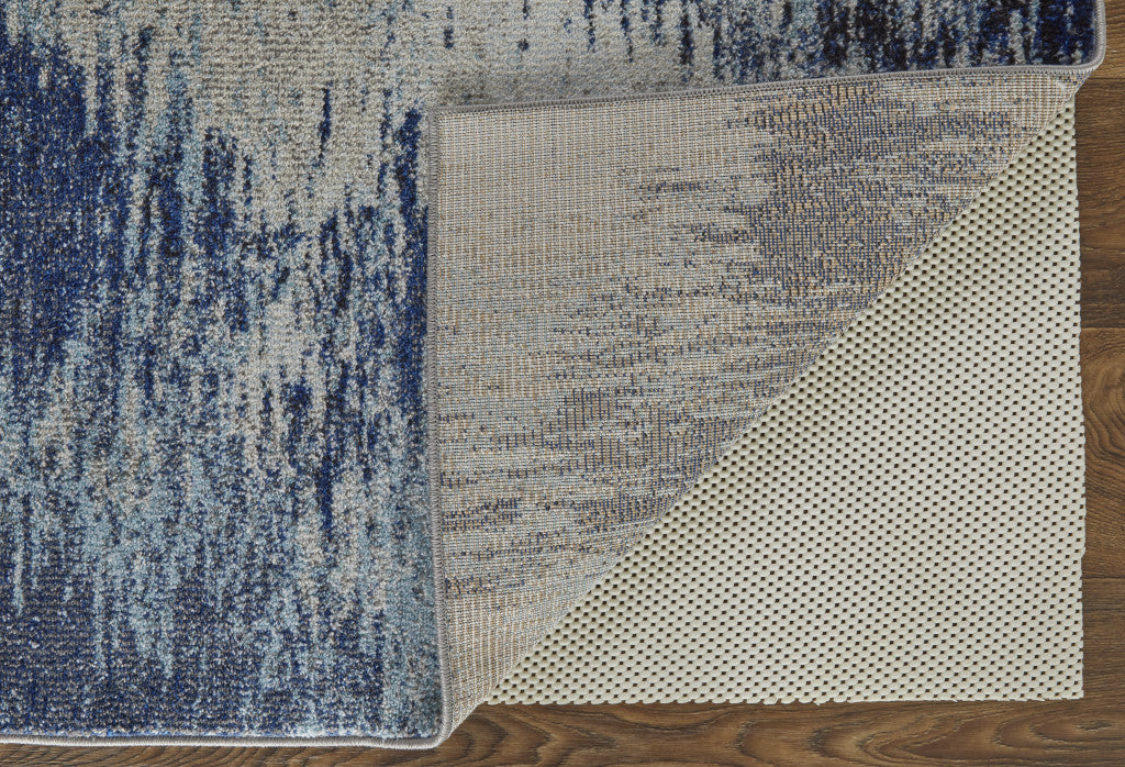 3' X 5' Blue And Ivory Abstract Power Loom Stain Resistant Area Rug