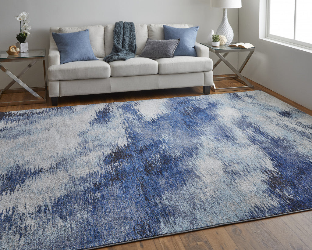 5' X 8' Blue And Ivory Abstract Power Loom Stain Resistant Area Rug