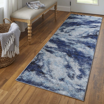 10' X 14' Blue And Ivory Abstract Power Loom Stain Resistant Area Rug