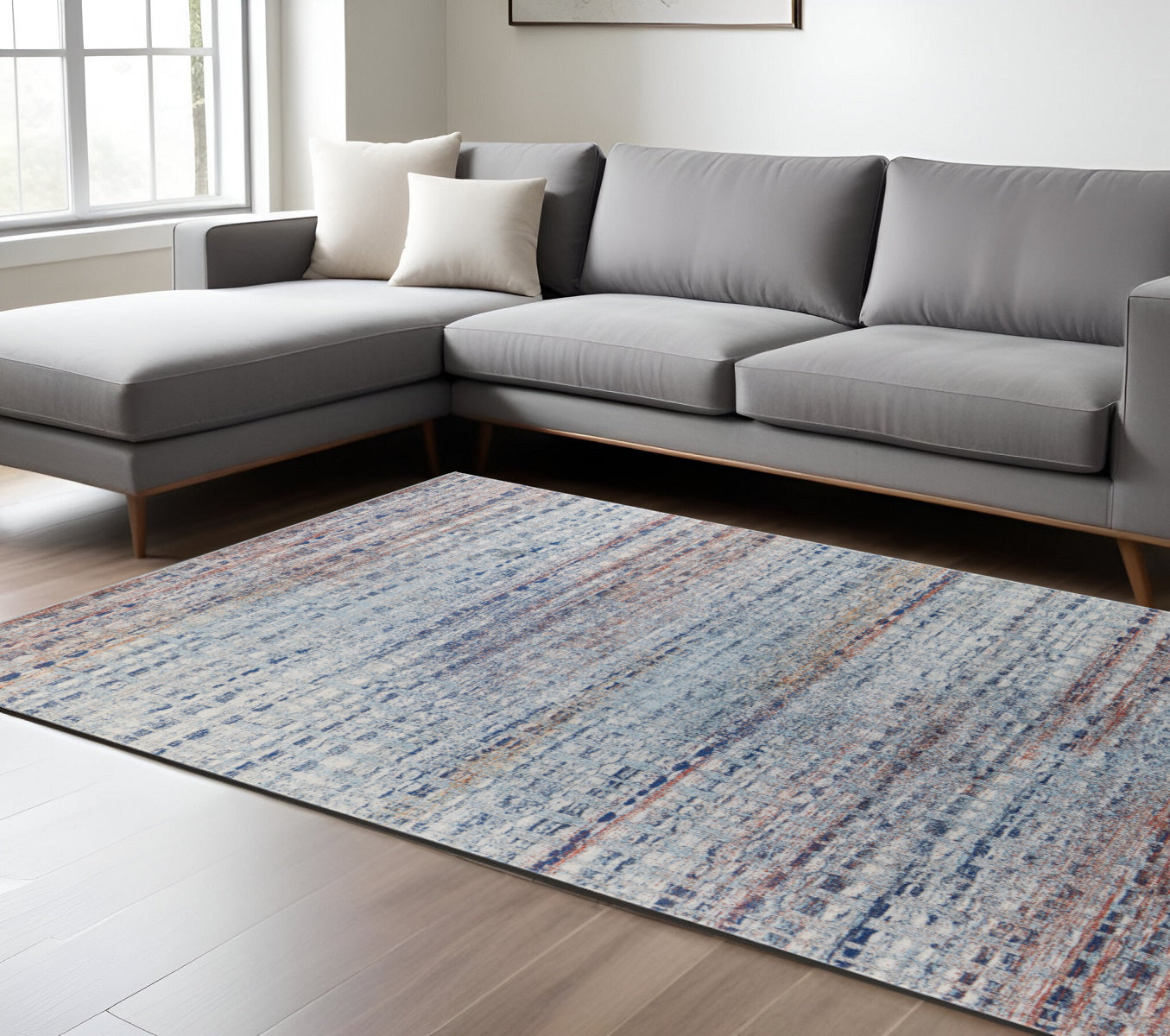 10' X 14' Blue Ivory And Orange Abstract Power Loom Stain Resistant Area Rug