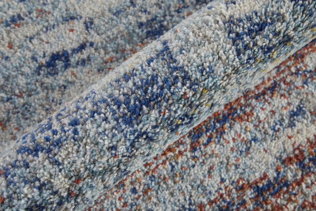 10' X 14' Blue Ivory And Orange Abstract Power Loom Stain Resistant Area Rug