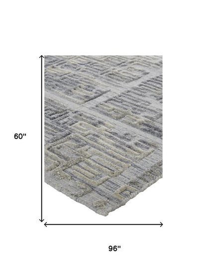 4' X 6' Gray and Ivory Abstract Hand Woven Area Rug