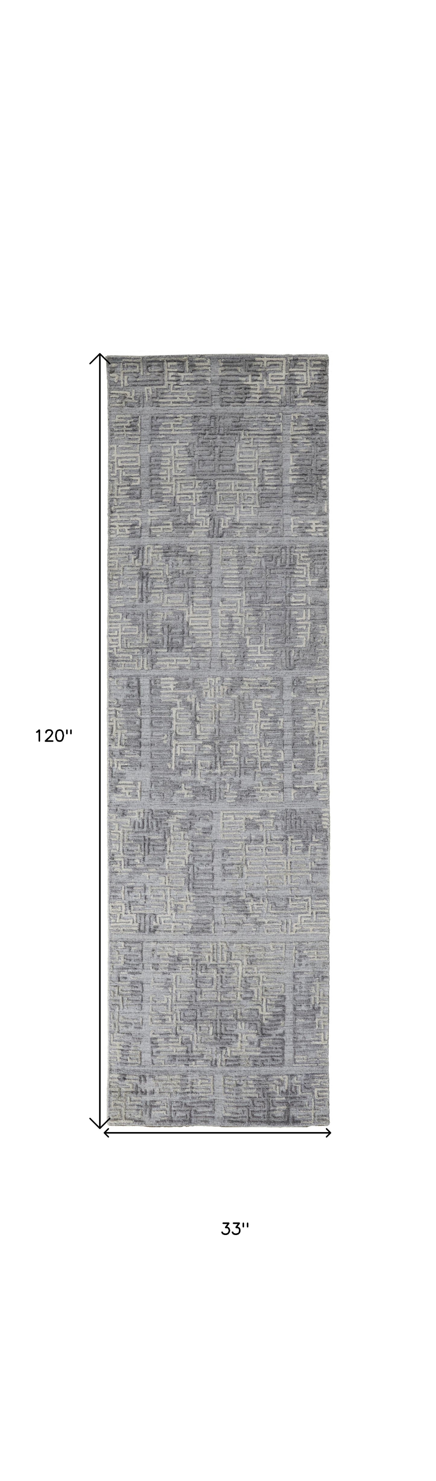 4' X 6' Gray And Ivory Abstract Hand Woven Area Rug