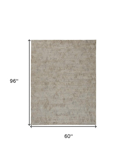5' X 8' Taupe And Gray Abstract Hand Woven Area Rug