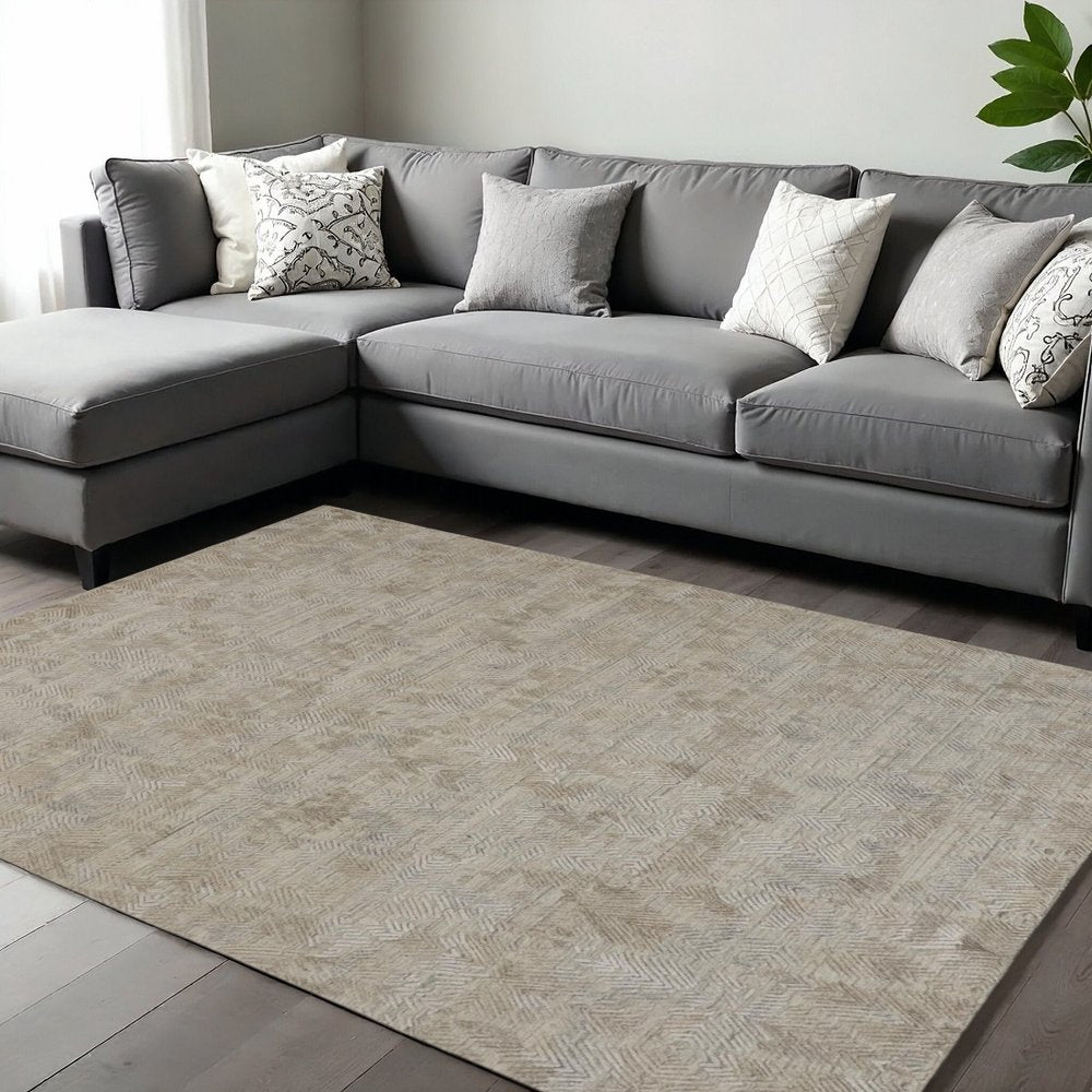5' X 8' Taupe And Gray Abstract Hand Woven Area Rug
