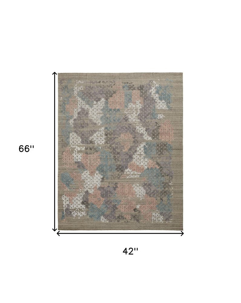 9' X 12' Pink Blue And Taupe Abstract Hand Woven Area Rug
