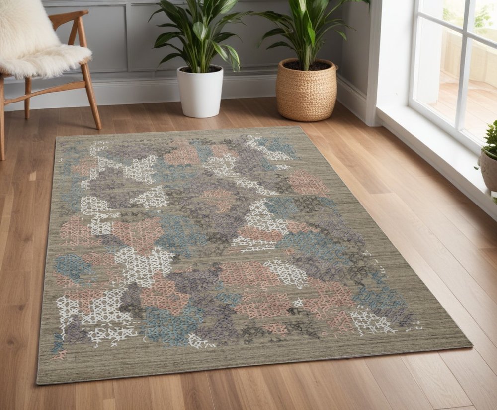 9' X 12' Pink Blue And Taupe Abstract Hand Woven Area Rug