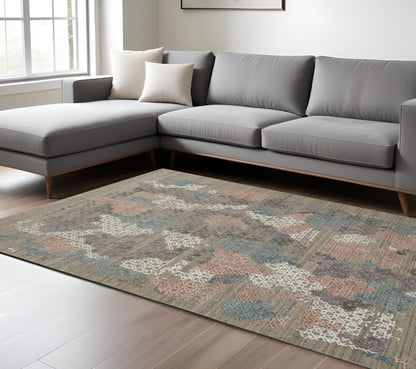 9' X 12' Pink Blue And Taupe Abstract Hand Woven Area Rug