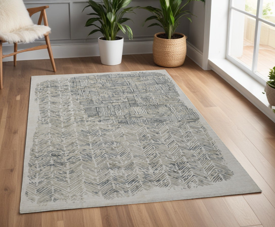 4' X 6' Blue and Ivory Abstract Hand Woven Distressed Area Rug