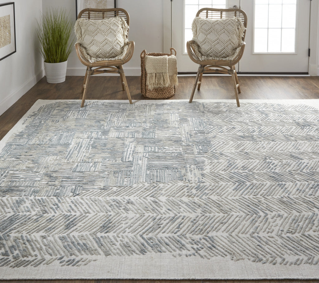 4' X 6' Blue and Ivory Abstract Hand Woven Distressed Area Rug