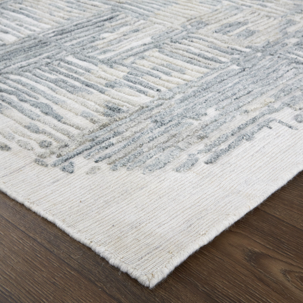 4' X 6' Blue and Ivory Abstract Hand Woven Distressed Area Rug