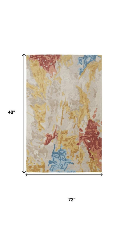4' X 6' Ivory Yellow And Blue Wool Abstract Tufted Handmade Stain Resistant Area Rug