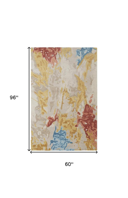 4' X 6' Ivory Yellow And Blue Wool Abstract Tufted Handmade Stain Resistant Area Rug