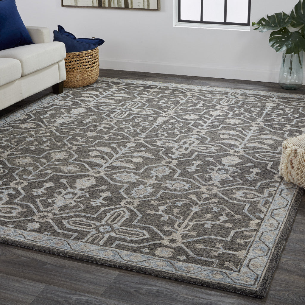 5' X 8' Gray Blue And Ivory Wool Floral Tufted Handmade Stain Resistant Area Rug