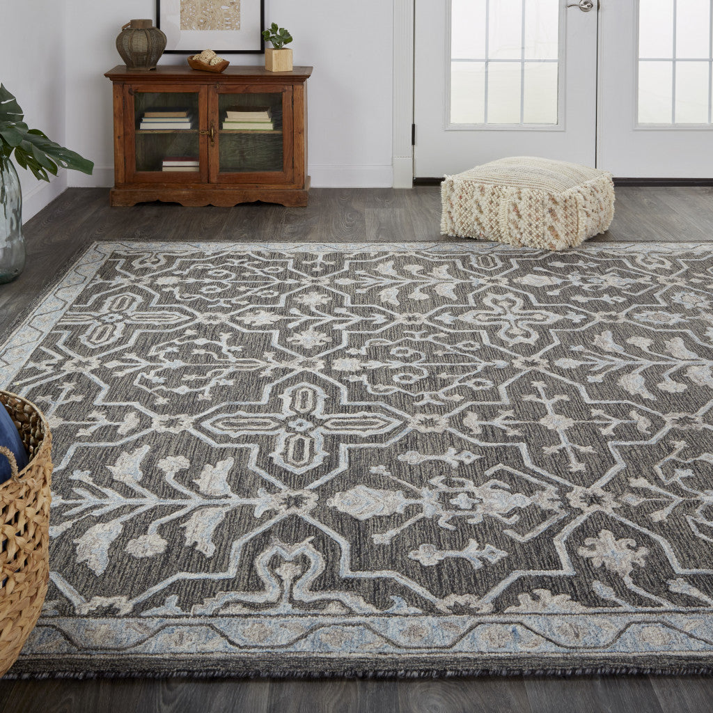 5' X 8' Gray Blue And Ivory Wool Floral Tufted Handmade Stain Resistant Area Rug