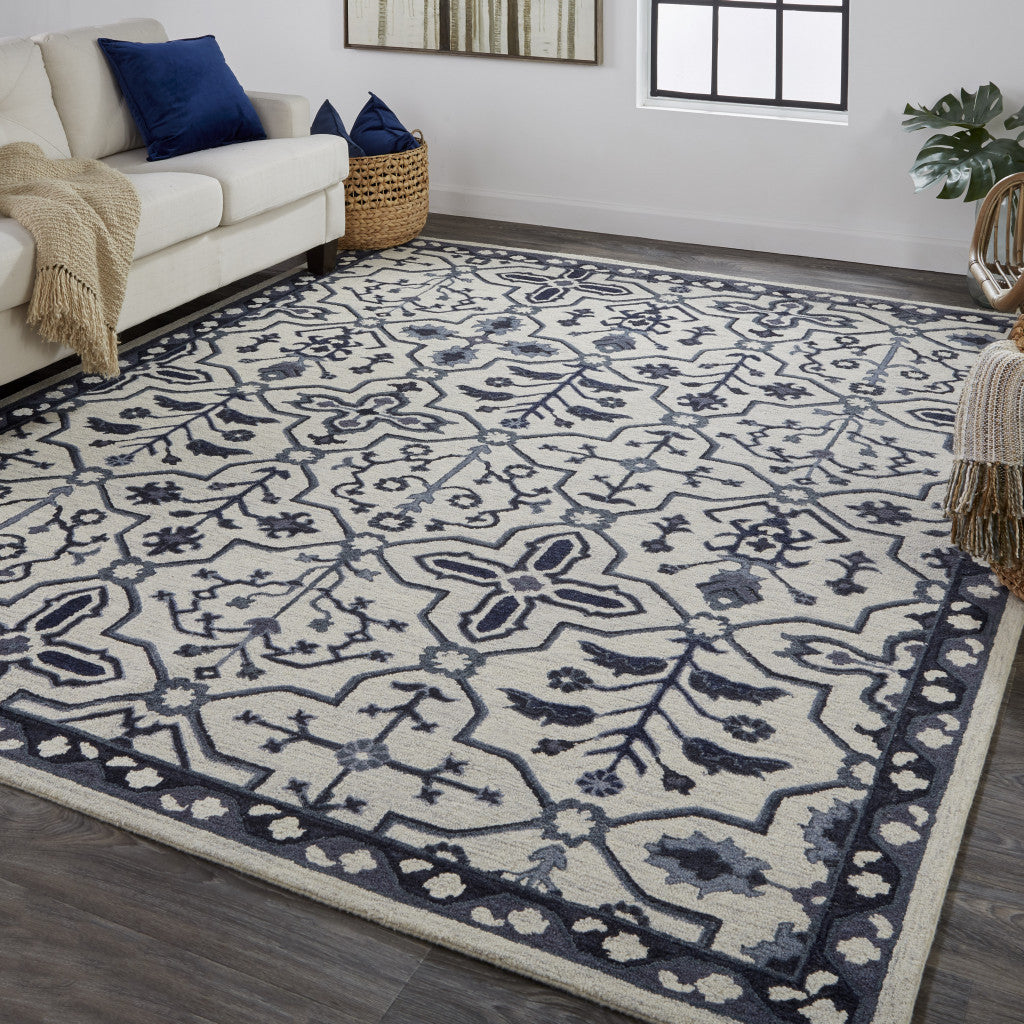 5' X 8' Gray Blue And Ivory Wool Floral Tufted Handmade Stain Resistant Area Rug