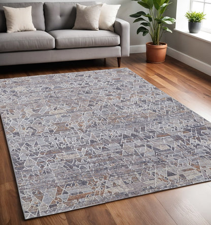 5' X 8' Blue Gray And Orange Abstract Distressed Area Rug