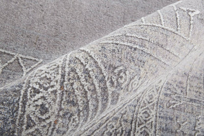 12' X 15' Gray Ivory And Orange Geometric Power Loom Distressed Stain Resistant Area Rug