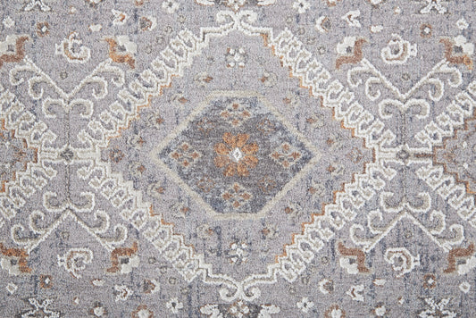 7' X 9' Gray Orange And Ivory Floral Power Loom Stain Resistant Area Rug