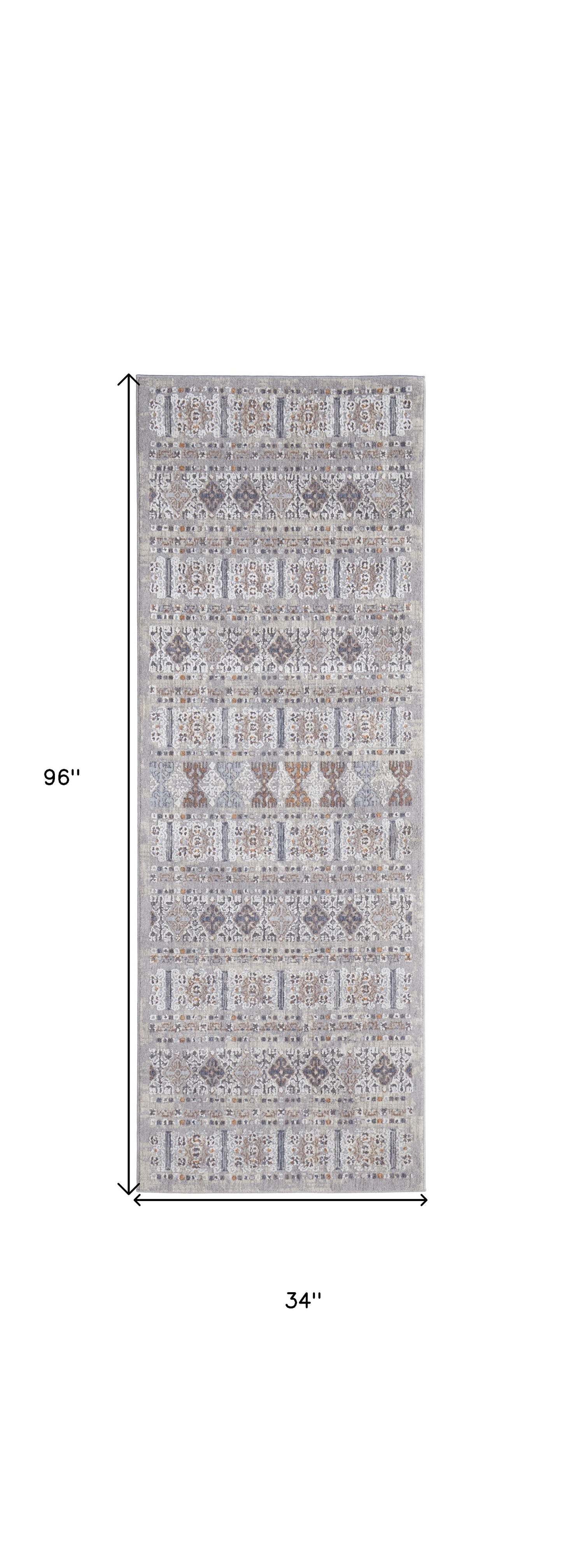 4' X 6' Orange Gray And White Geometric Power Loom Distressed Stain Resistant Area Rug