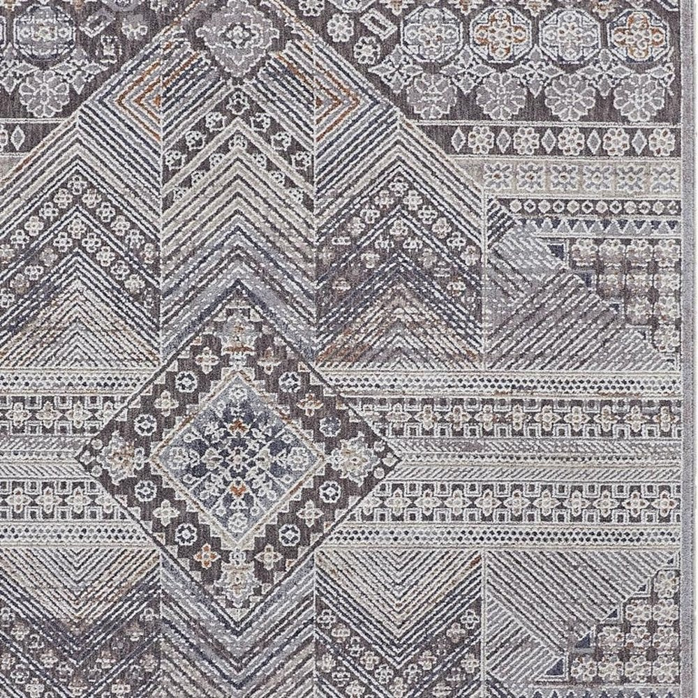 12' X 15' Ivory And Gray Geometric Power Loom Distressed Stain Resistant Area Rug