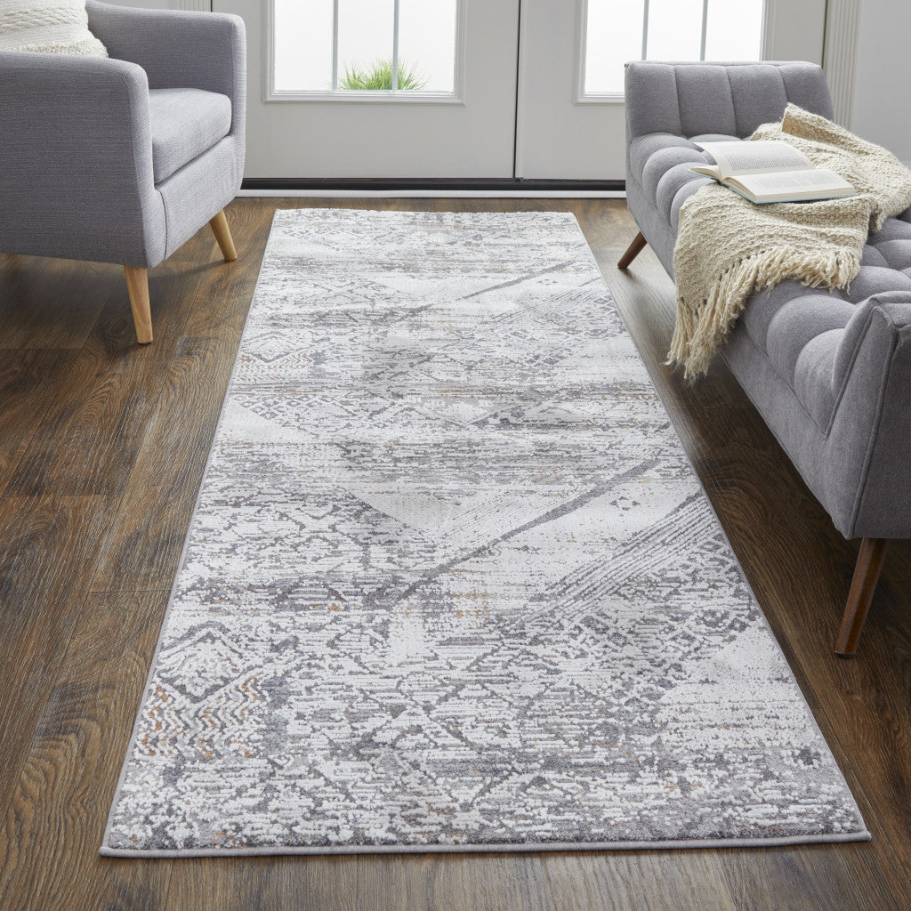 8' X 10' Ivory And Gray Geometric Power Loom Distressed Stain Resistant Area Rug