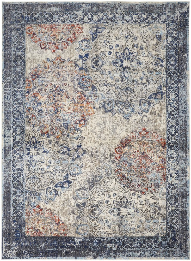 7' X 10' Blue and Ivory Floral Power Loom Distressed Non Skid Area Rug
