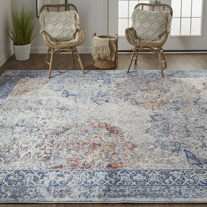 7' X 10' Blue and Ivory Floral Power Loom Distressed Non Skid Area Rug