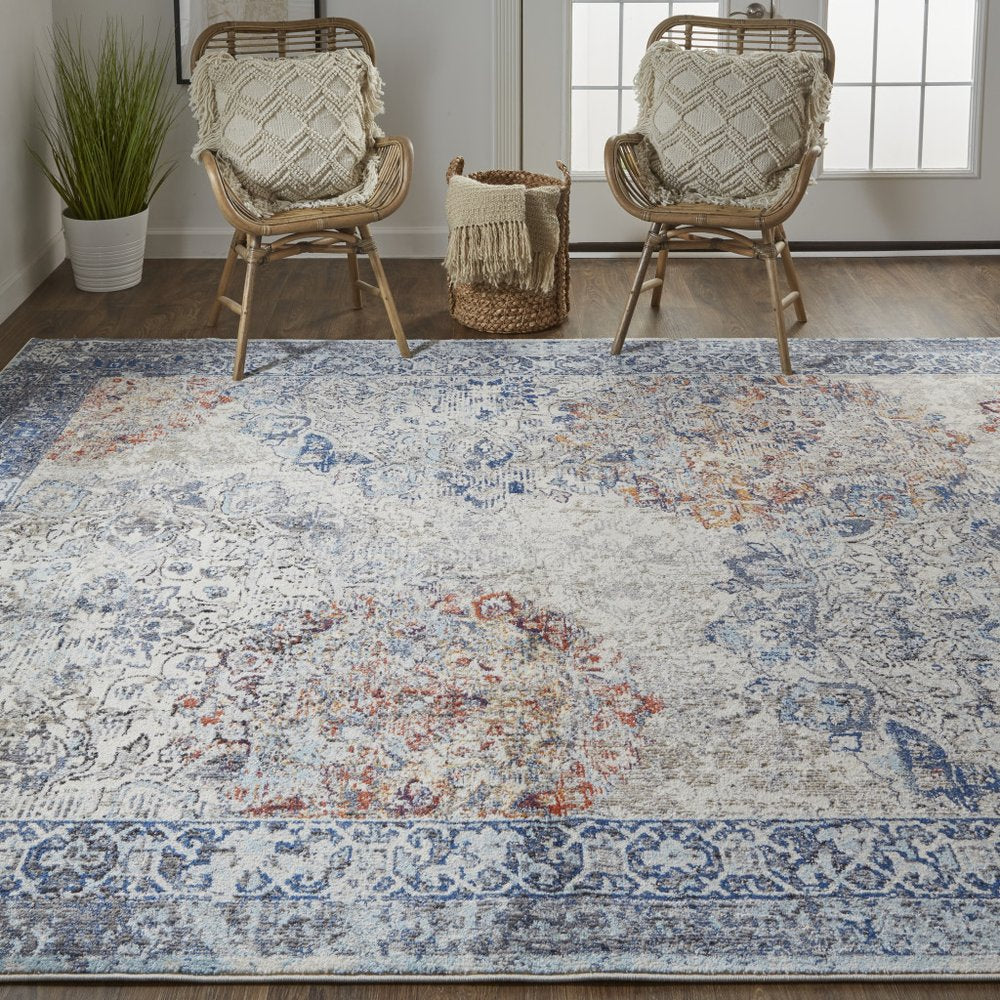 7' X 10' Blue and Ivory Floral Power Loom Distressed Non Skid Area Rug